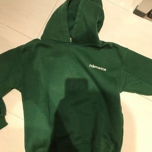 Green “namaste” hoodie